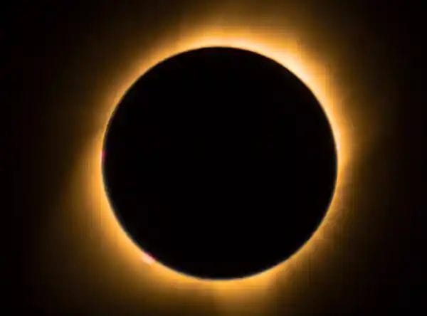 Total solar eclipse with visible solar corona, highlighting the total eclipse experience in Spain.