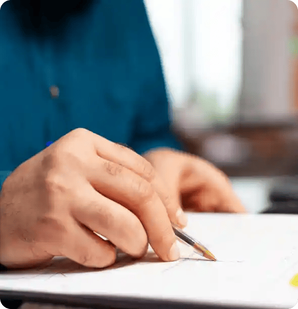 Person reviewing documents and checklist showing guidelines for the Spectrum Win-Win referral programme.